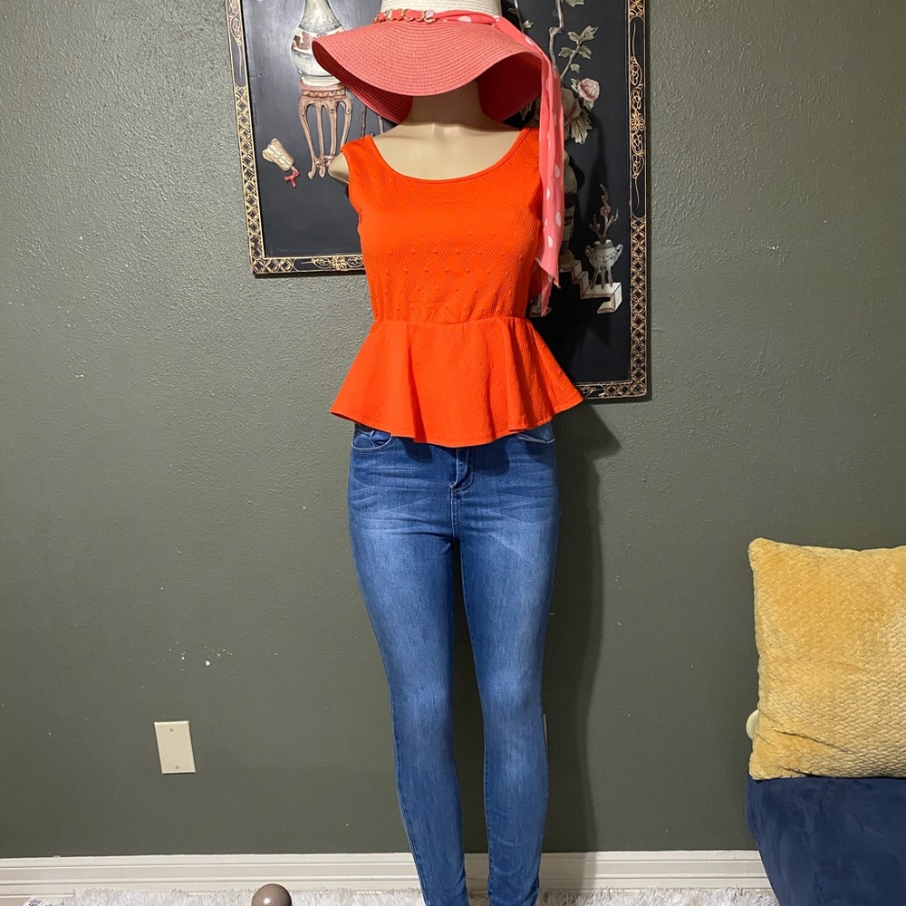Coral peplum shirt with bow detail